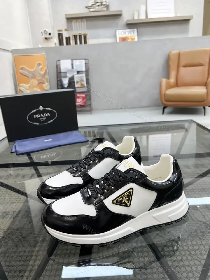 View 1 of Black & White Leather High-Tops with Prada Detailing - Luxe Comfort