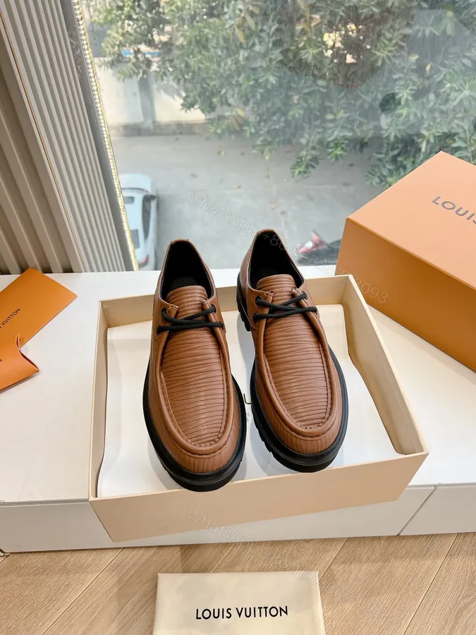 View 1 of LV Women Brown Textured Leather Loafers