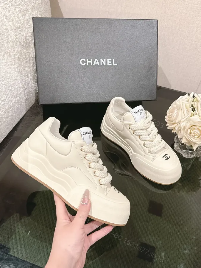 View 1 of White Leather Couture Sneakers: Luxe Comfort & Everyday Style