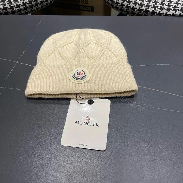 View 1 of Cream Knit Beanie + Wool Blend + Classic + Subtle Moncler Patch + Beanie