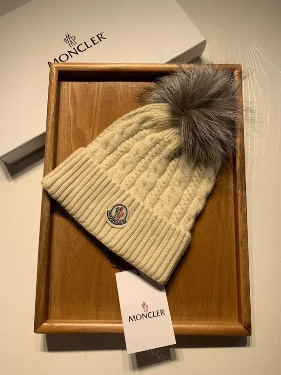 View 1 of Cream Cable-Knit Beanie with Faux-Fur Pom-Pom: Moncler Warmth