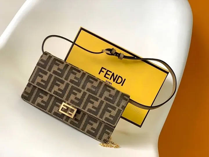 View 1 of Compact Monogram Canvas Bag with Gold Hardware - Luxe Messenger