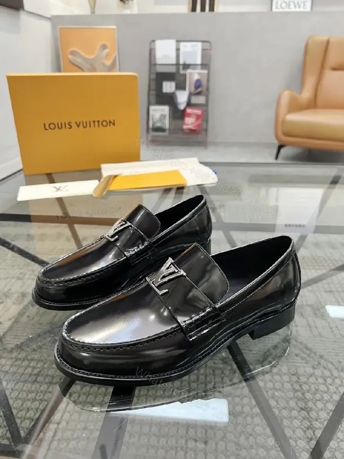 View 1 of Classic Black Leather Loafers with Luxe Hardware