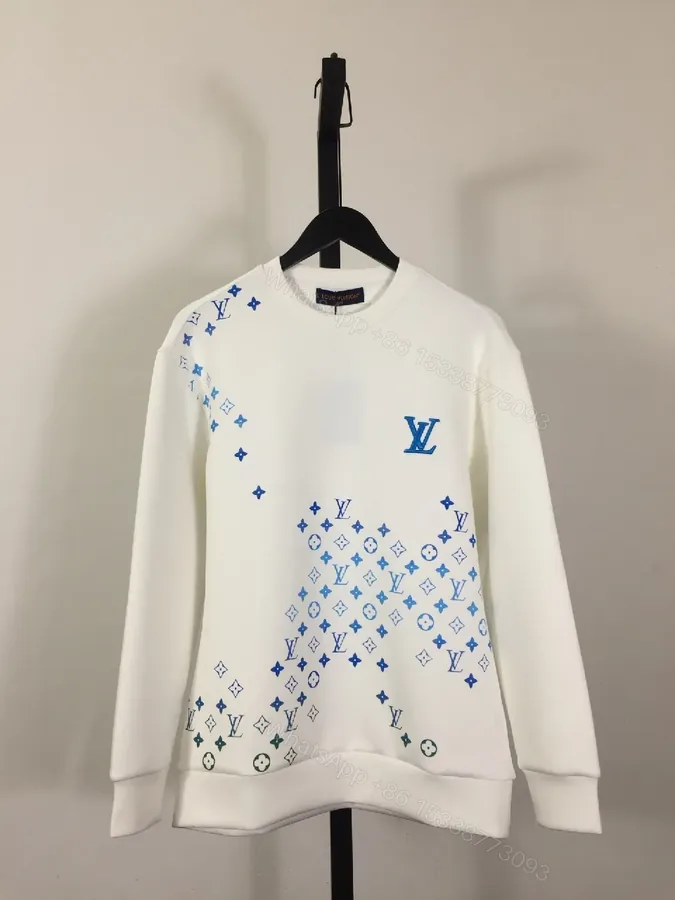 View 1 of White Luxe Sweatshirt with Subtle Blue LV Motifs