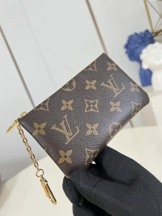 View 1 of Brown Monogram Luxe Compact Wallet with Gold Zipper