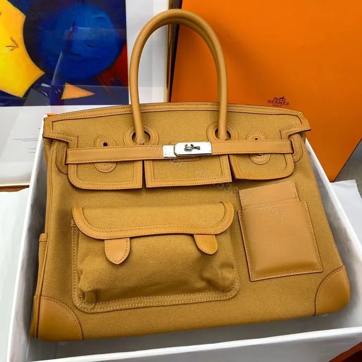 View 1 of HERMES Cargo Ecru Toile Hand Bag