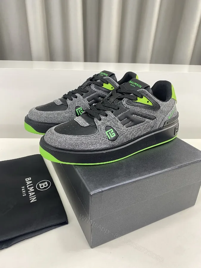 View 1 of Dynamic Gray Knit-Top Sneakers with Neon Accent Details