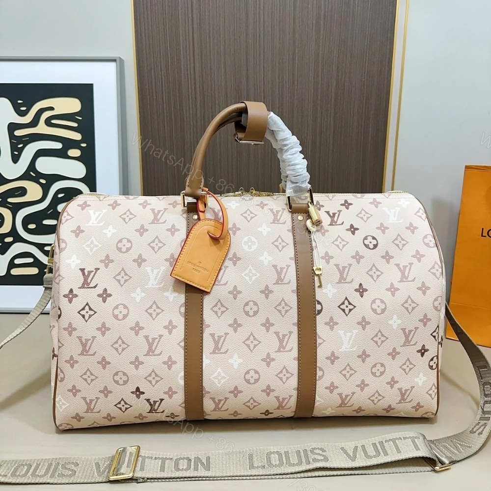 View 9 of Louis Vuitton Keepall Bandoulière 50 Monogram Beige 50Cm