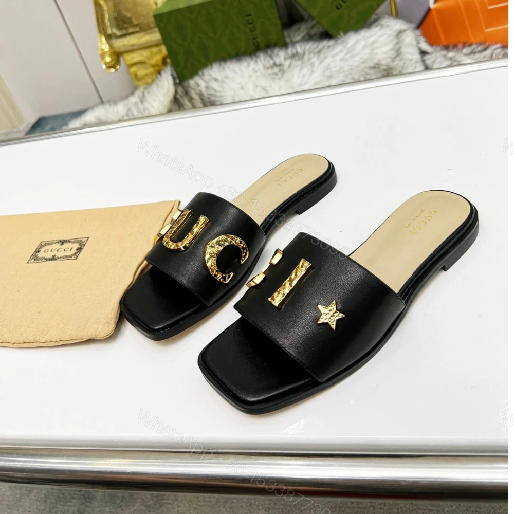 View 4 of GUCCI WOMEN’S LOGO EMBELLISHED SLIDE SANDALS BLACK