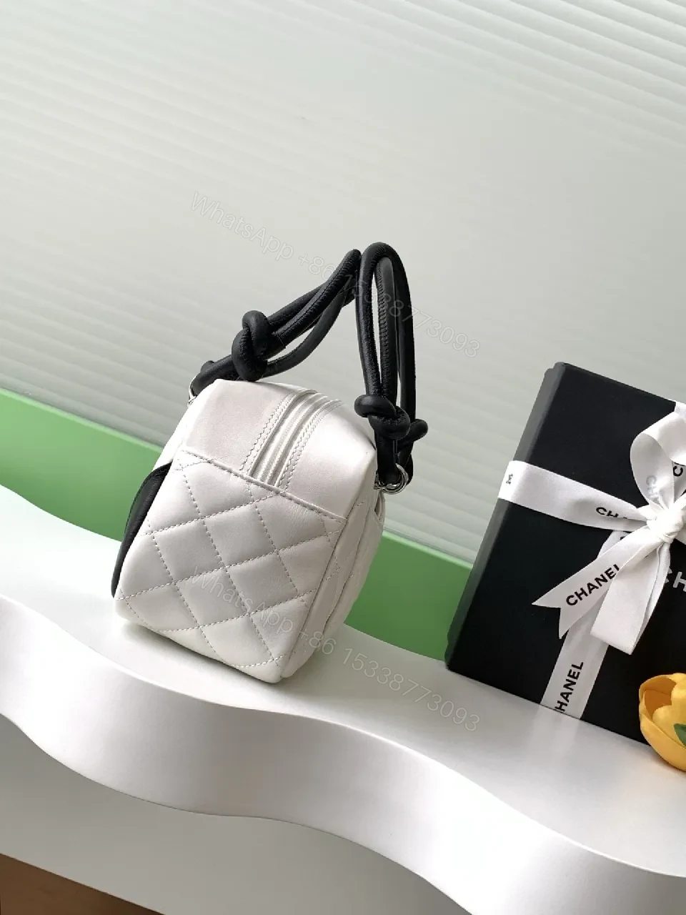 View 2 of Quilted Mini Bag with Signature Hardware - Dual-Tone Chic