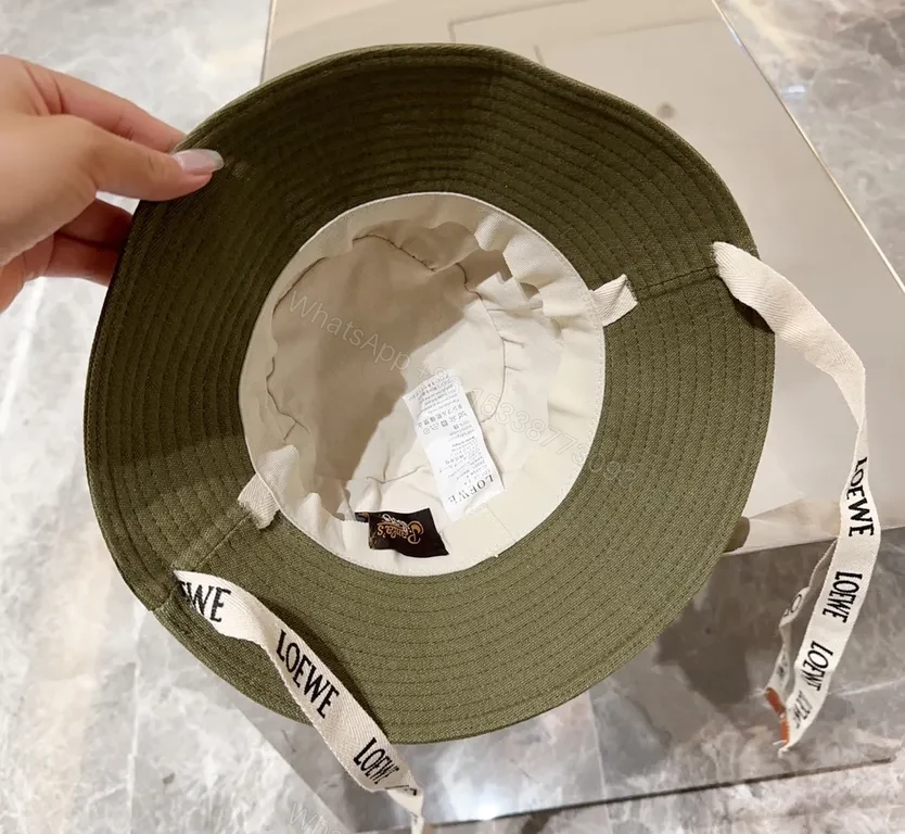 View 3 of Olive Canvas Bucket Hat: Subtle Luxury, LOEWE Patch