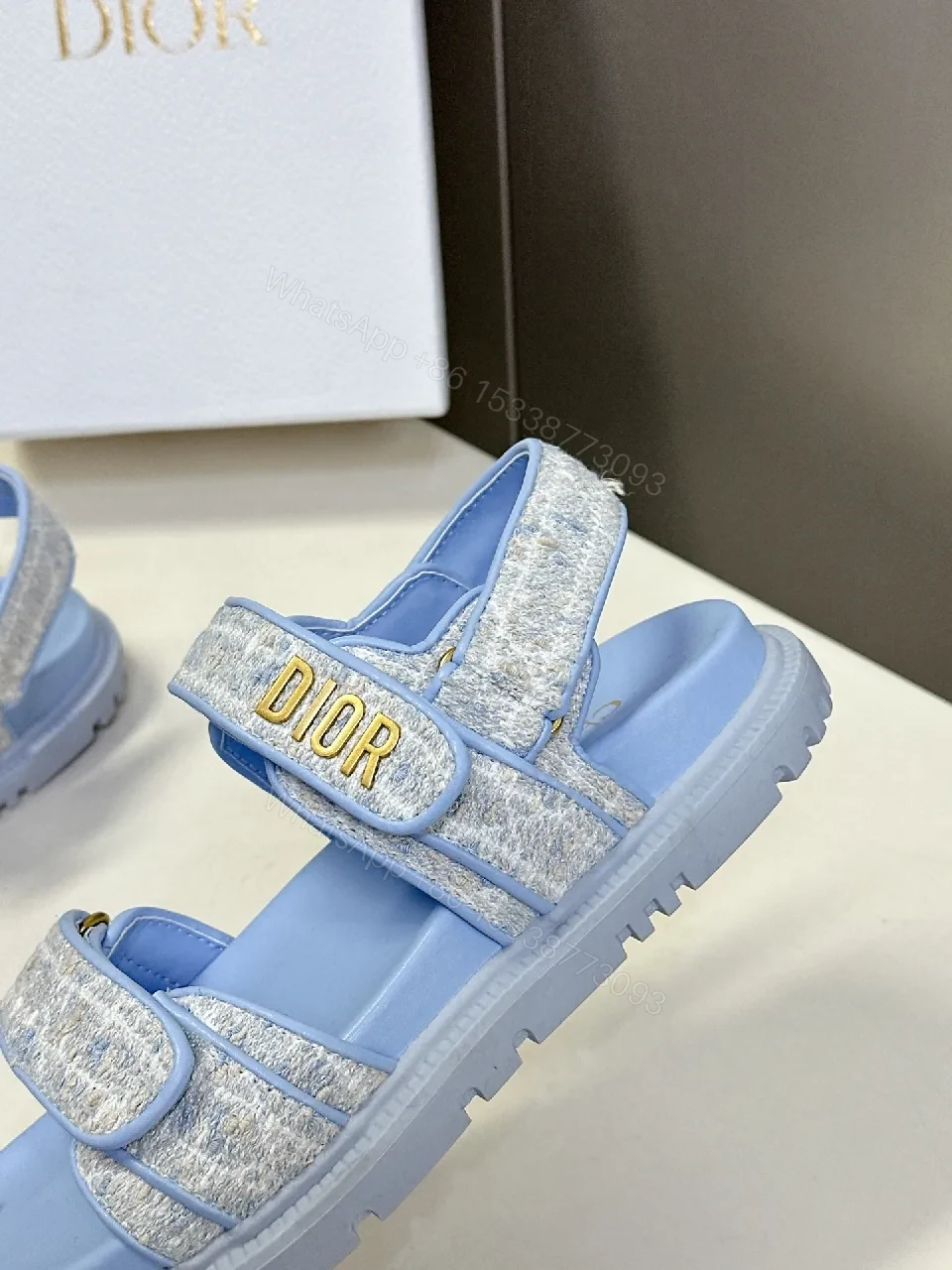 View 4 of Soft-Gleam Crest Sandals: Light-Blue Textured Straps, Minimal Logo