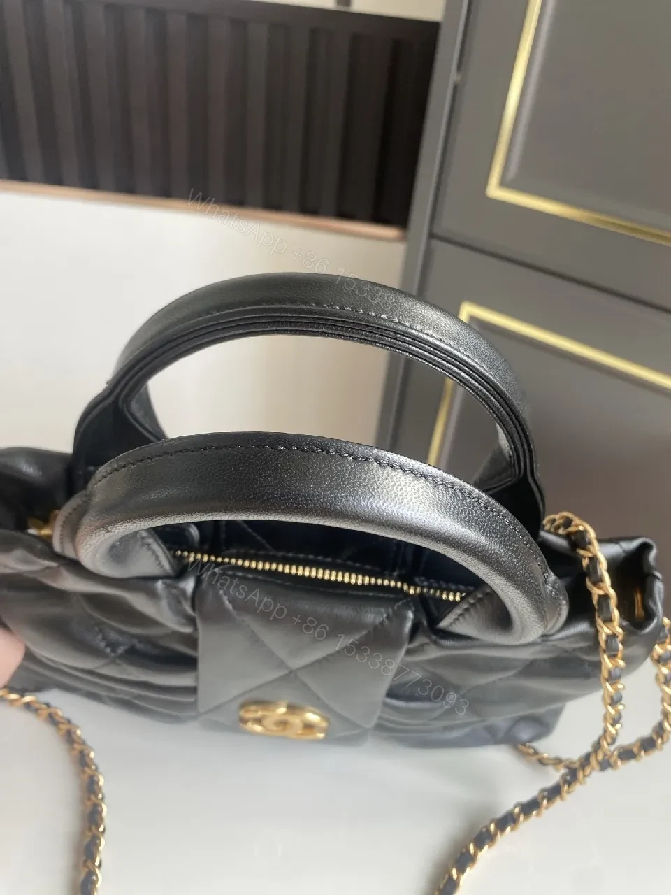 View 7 of Quilted Mini Bag: Black, Satin-like, Chic, Gold Hardware, Clutch
