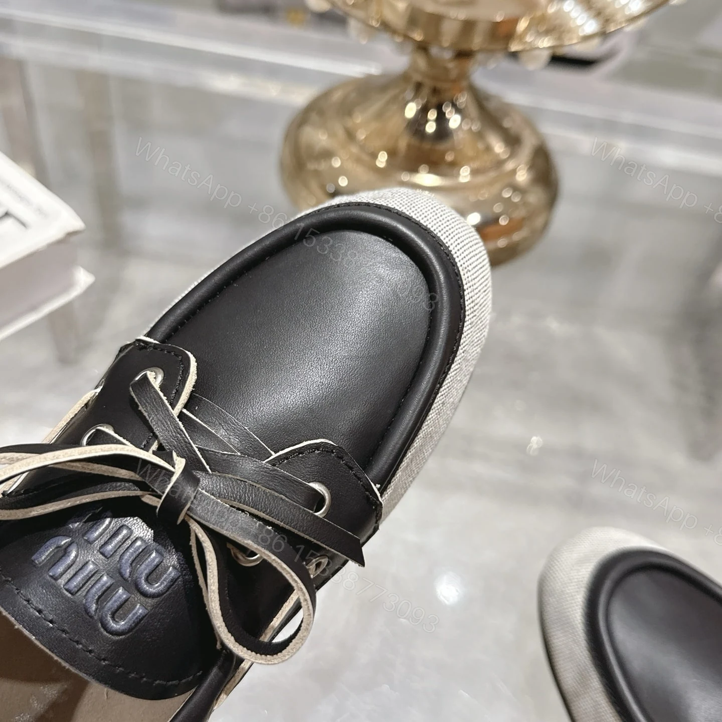 View 7 of MIUMIU CANVAS AND BLEACHED BOAT SHOES BLACK