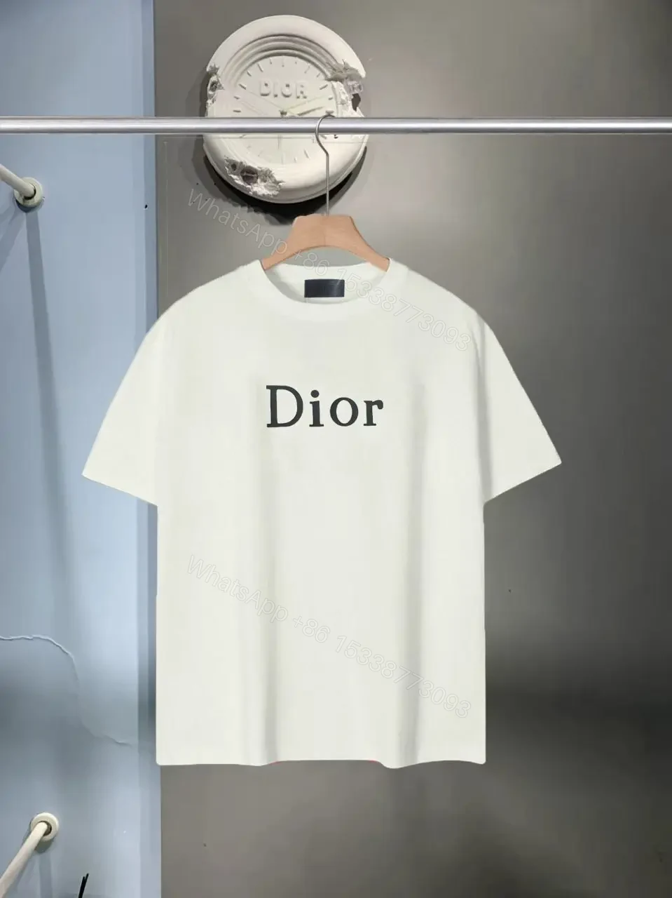 View 2 of Minimalist Black Knit Tee with Dior Logo Print, Unisex Fit