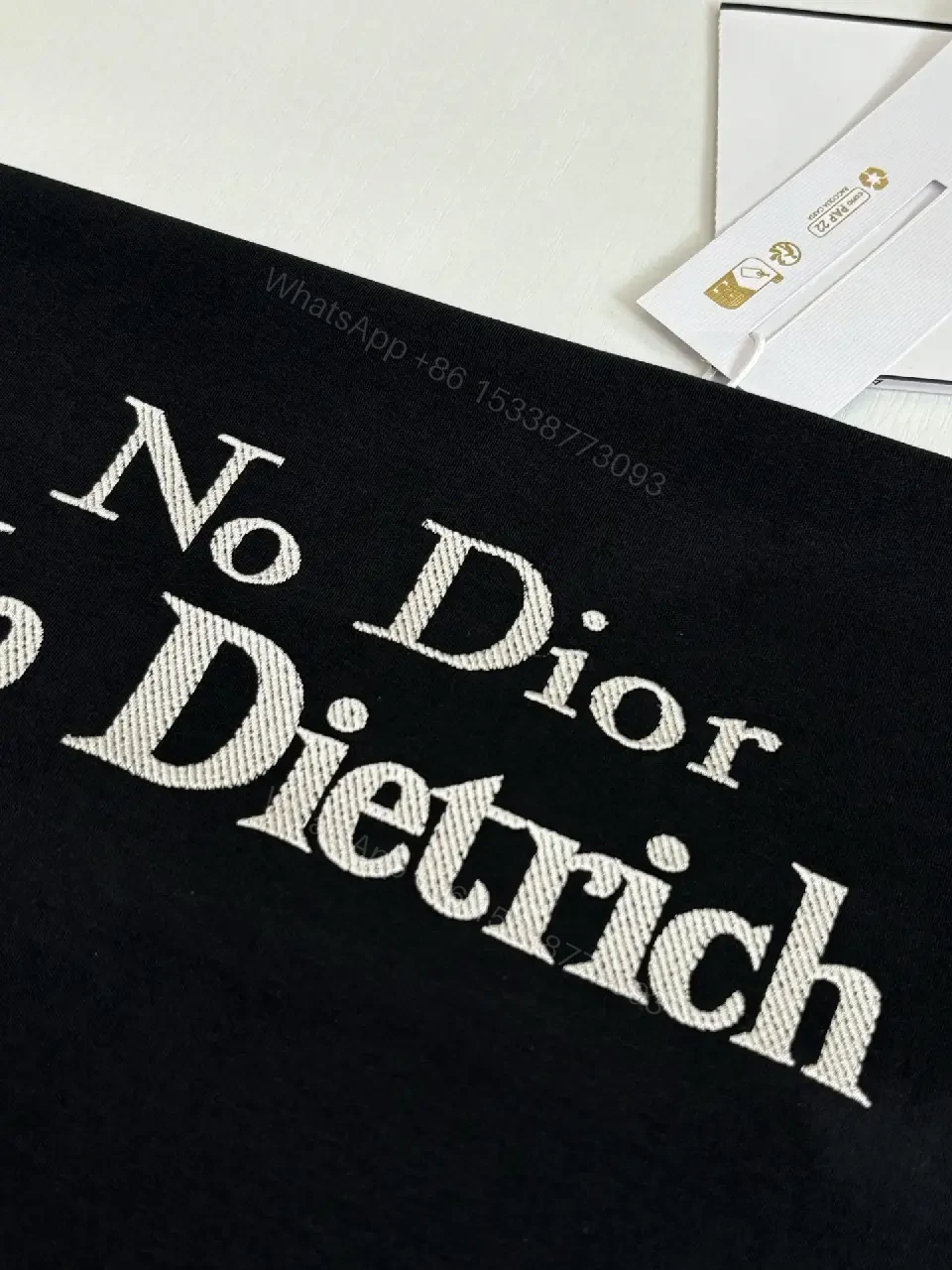 View 6 of Minimalist Black Cotton Tee with Bold No Dior No Dietrich Statement