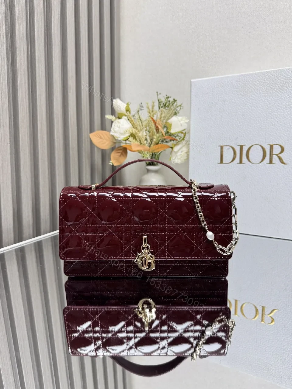 Burgundy Patent Leather Clutch: Geometric Quilted Luxury — view 1
