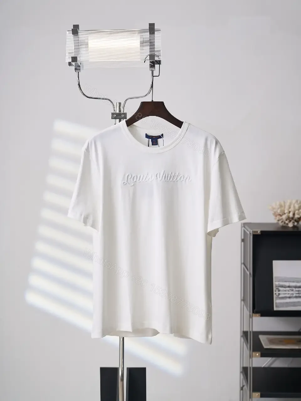 View 10 of White cotton T-shirt with luxury script embroidery for everyday elegance