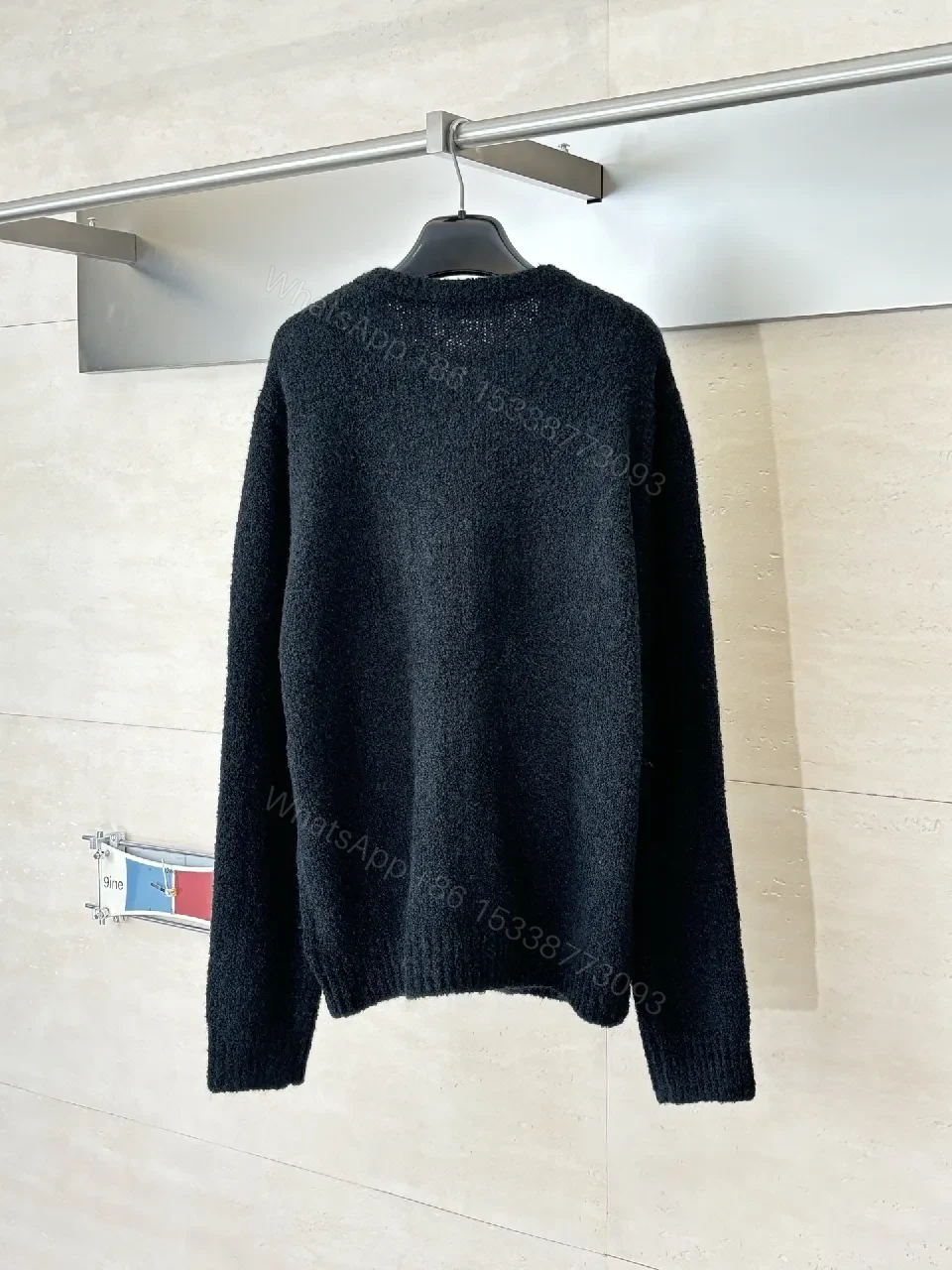 View 3 of Textured Bouclé Knit Cardigan - Subtle LV Logo, Versatile Warmth