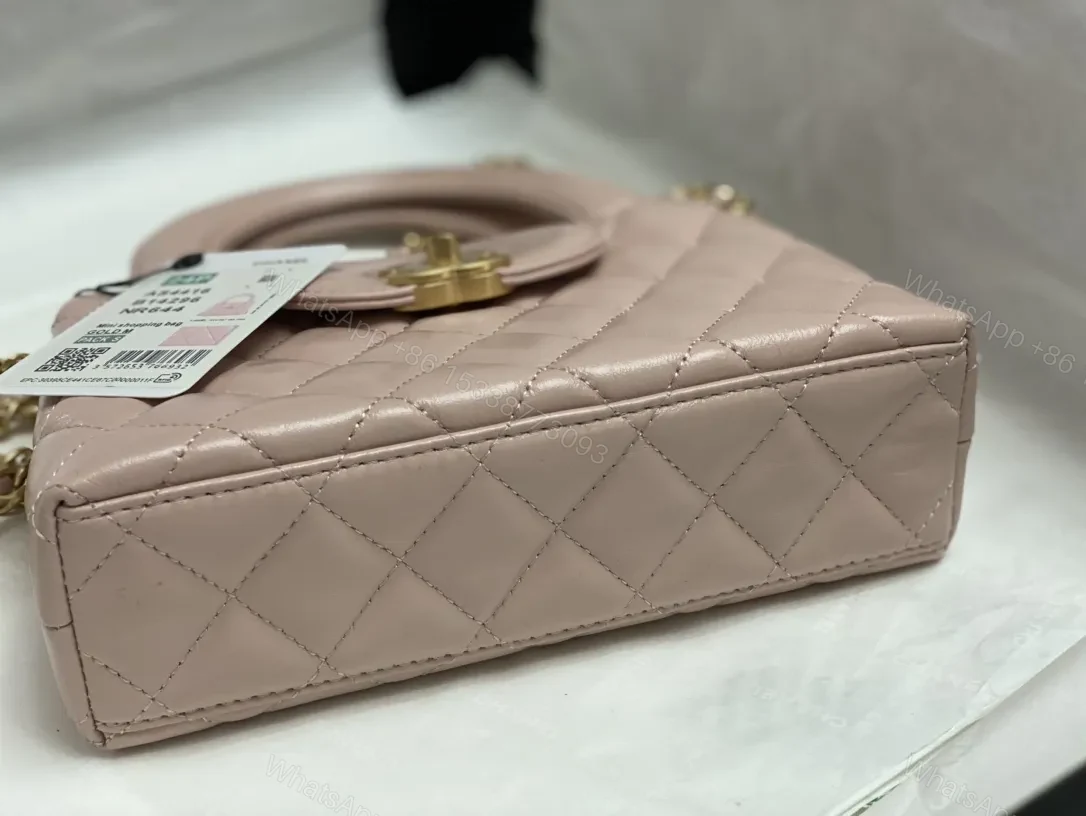 View 7 of Soft Pink Quilted Mini Bag with Gold Chain Handle - Everyday Luxe