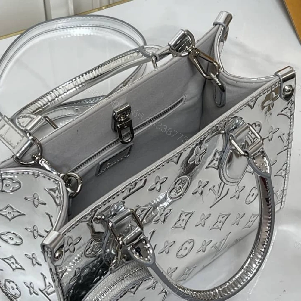 View 8 of Louis Vuitton Onthego PM Silver 25Cm M26373