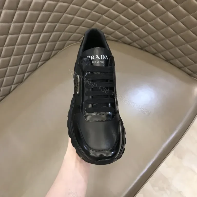 View 2 of Prada Black Leather Patent-Panel Sneakers, Discreet Luxury