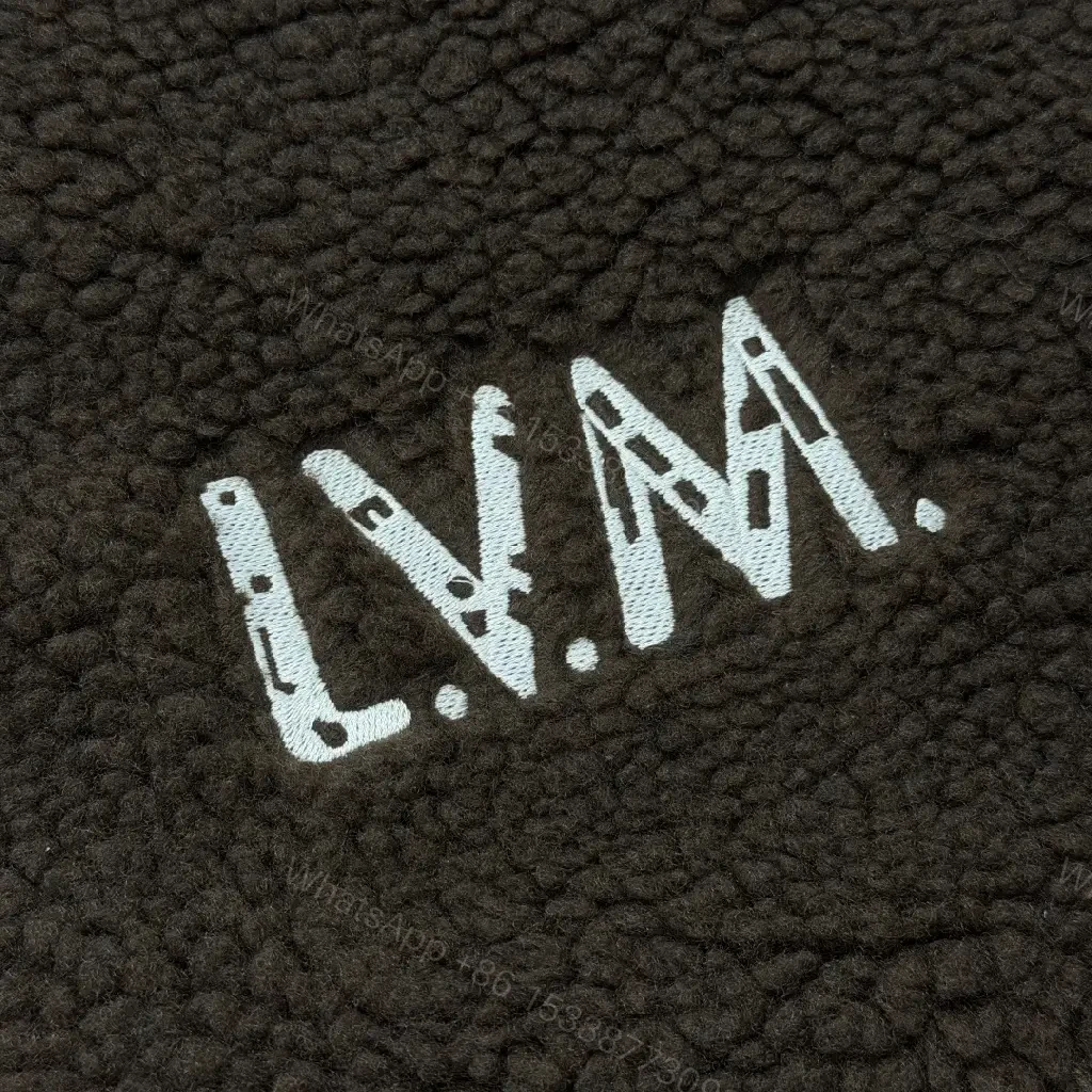 View 8 of Brown Sherpa Bomber Jacket with Monogram – Cozy Luxury Outerwear