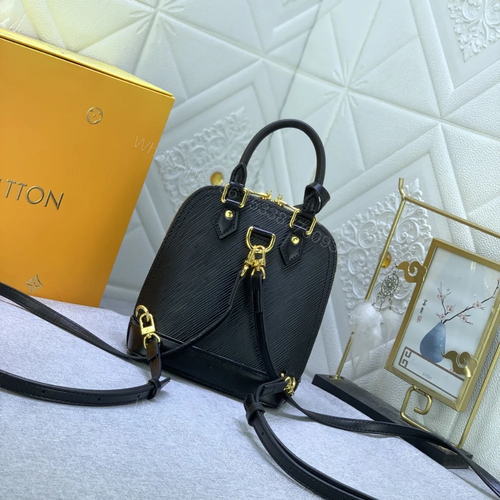 View 4 of Louis Vuitton Alma Backpack Epi Leather Black 20Cm M25103