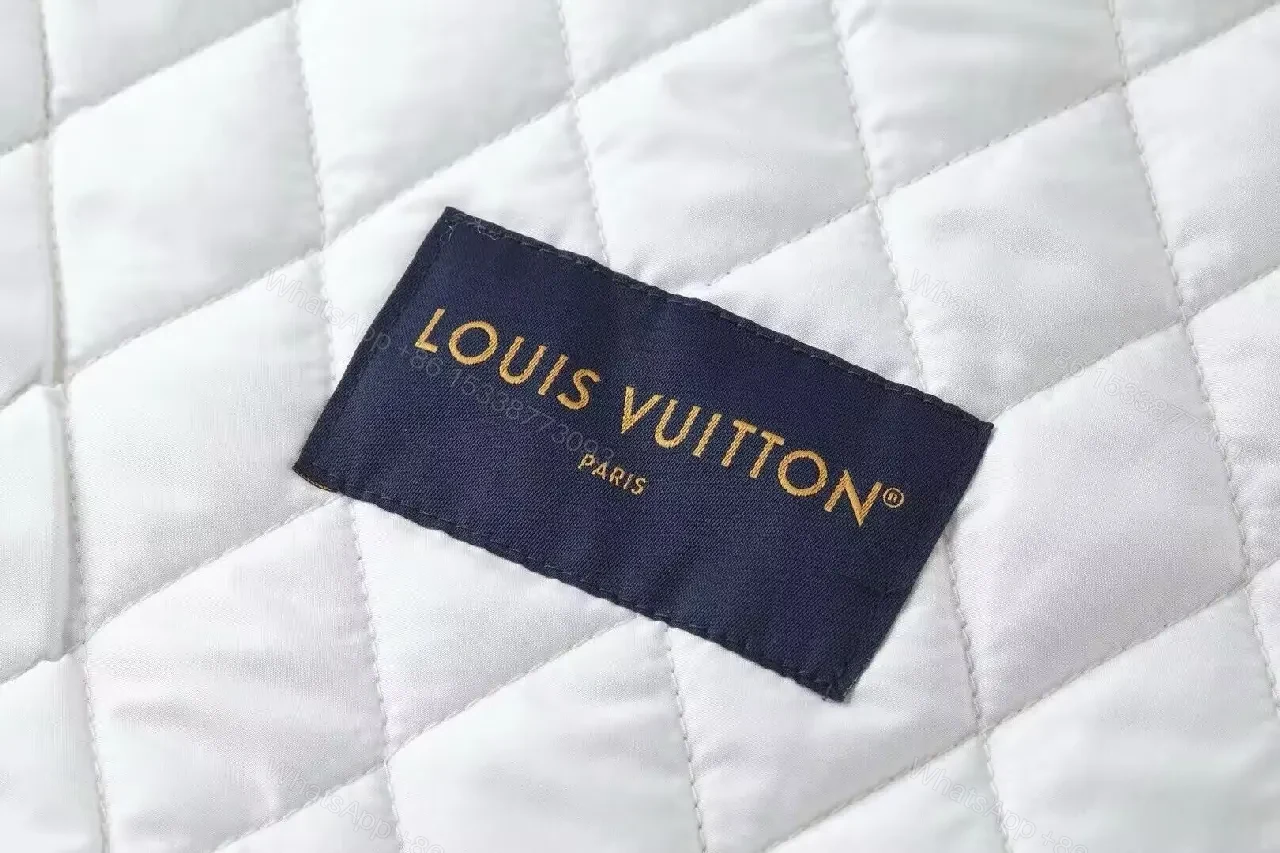 View 3 of Monogram Denim Varsity Jacket - Navy, Signature LV Detail