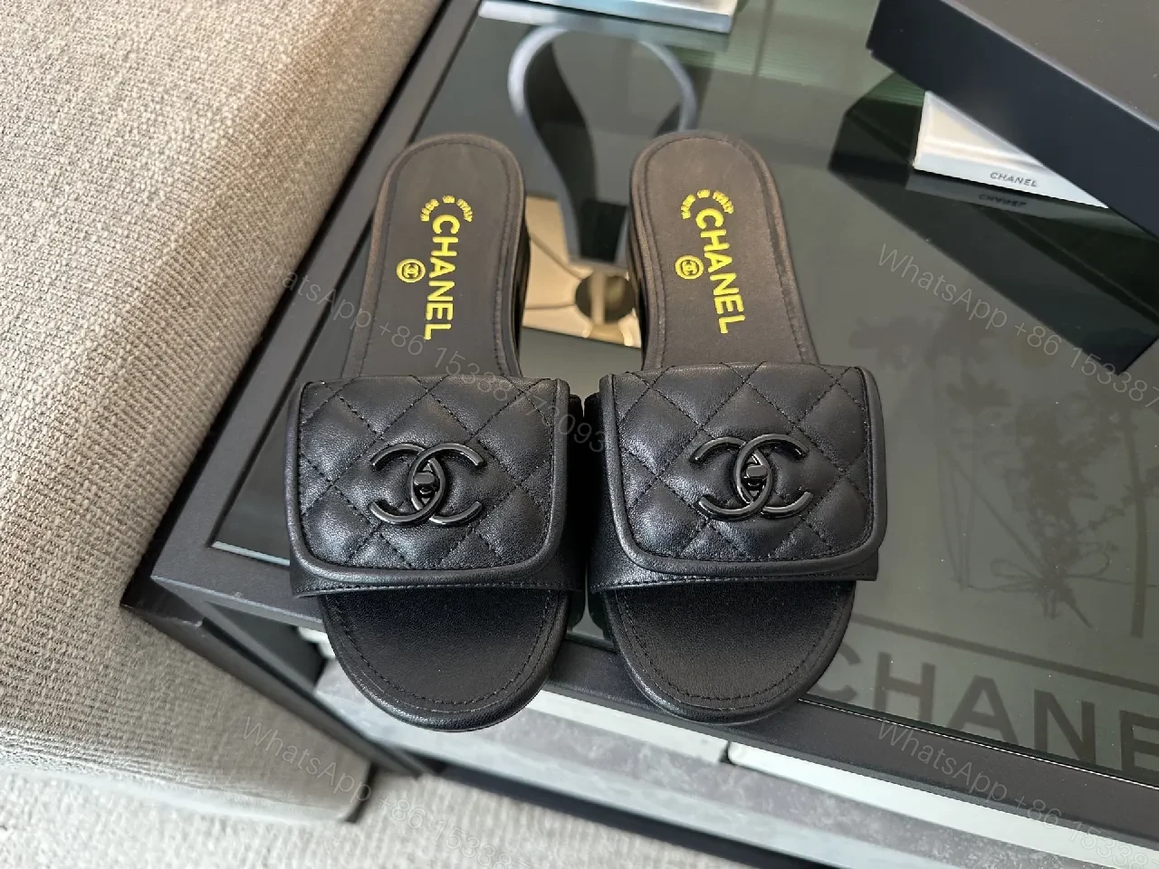 View 7 of Chic Black Quilted Slides with Logo Detailing