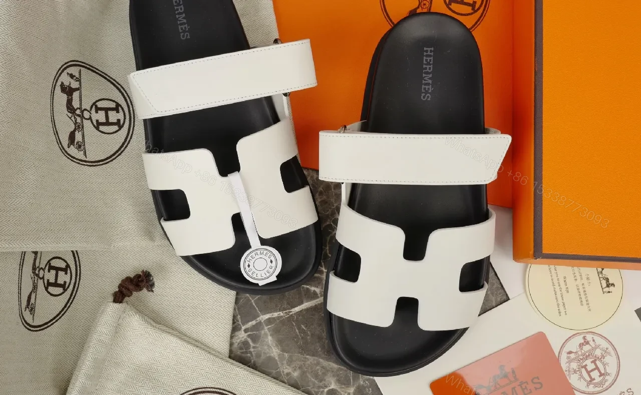 View 4 of Minimalist White Leather Sandals with Black Footbed and Hermes-Inspired Hardware