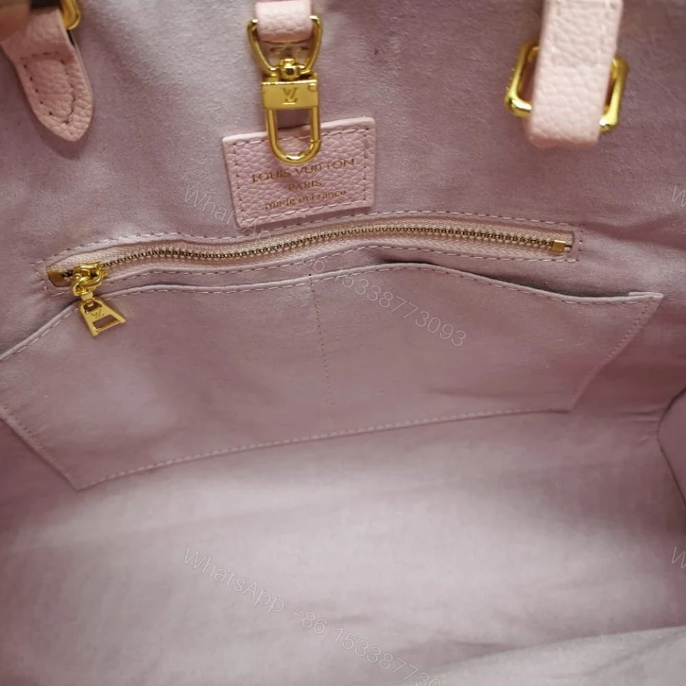 View 7 of Louis Vuitton Onthego MM Monogram Empreinte Leather Trianon Pink 33Cm M46286