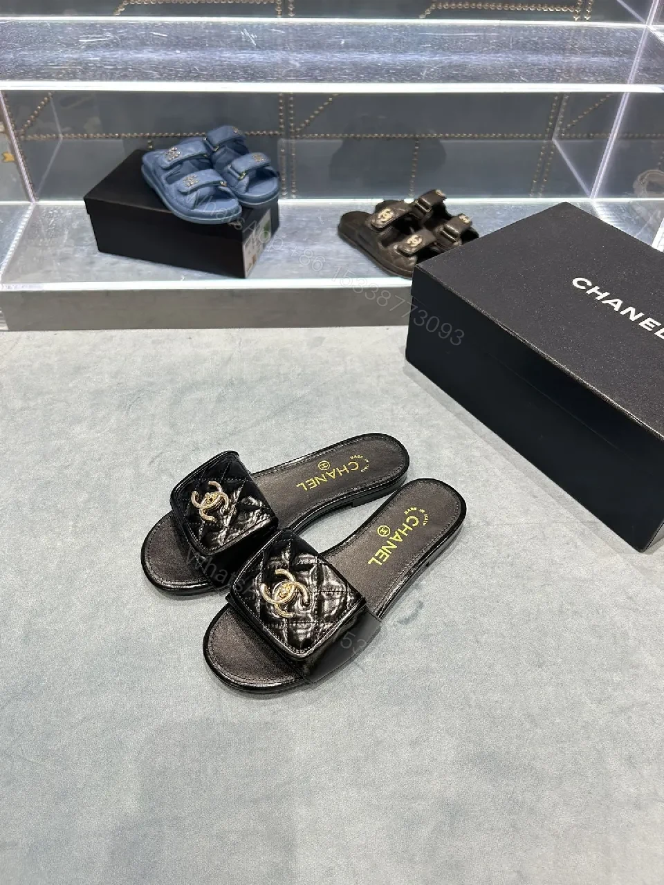 View 9 of Black Quilted Leather Slide with Gold Logo Escort