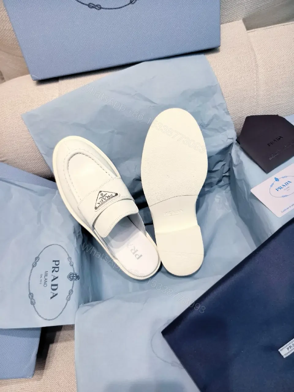 View 8 of White Leather Prada Slip-ons: Classic Padded Comfort Shoes