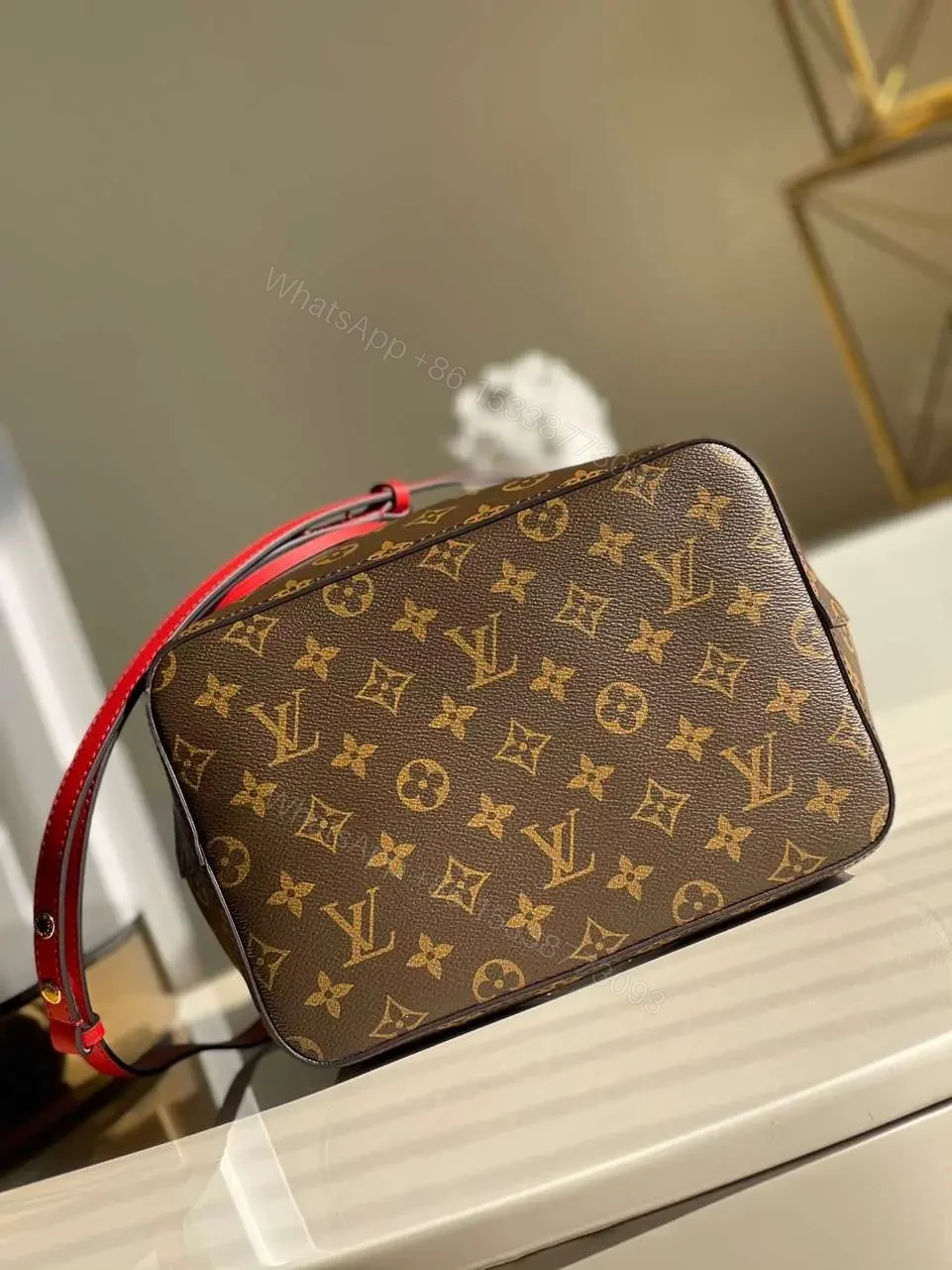 View 2 of Louis Vuitton LV NeoNoe Handle Red Handbags Monogram 26x22x27cm