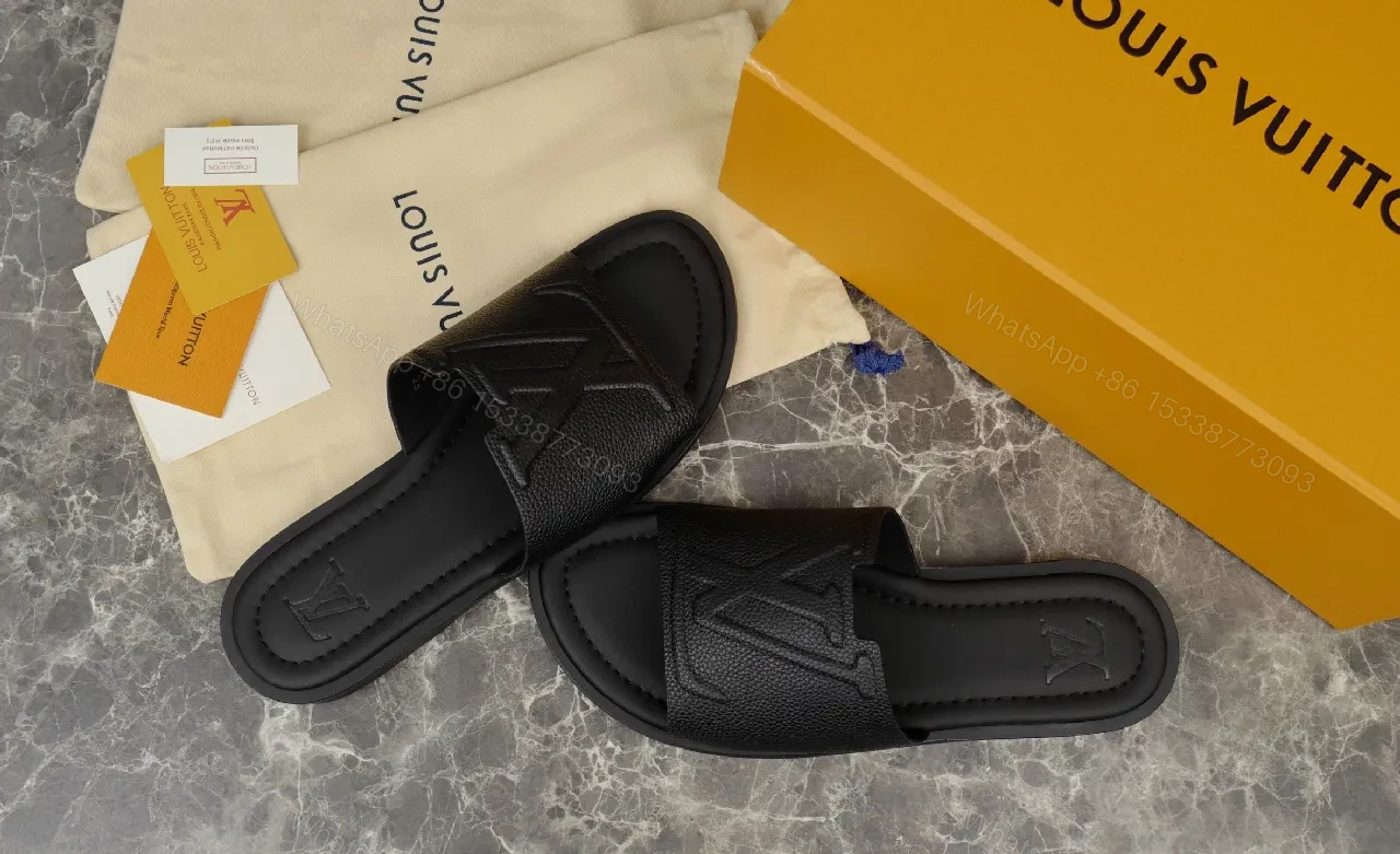 View 3 of Bold Leather Slides with Monogram Texture – Everyday Luxury