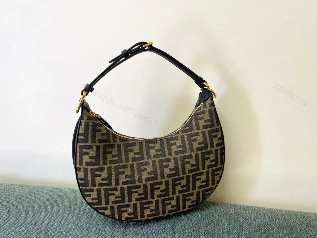 Bold Logo Hobo Bag: Monogramed Leather & Canvas, Gold Accents — view 1