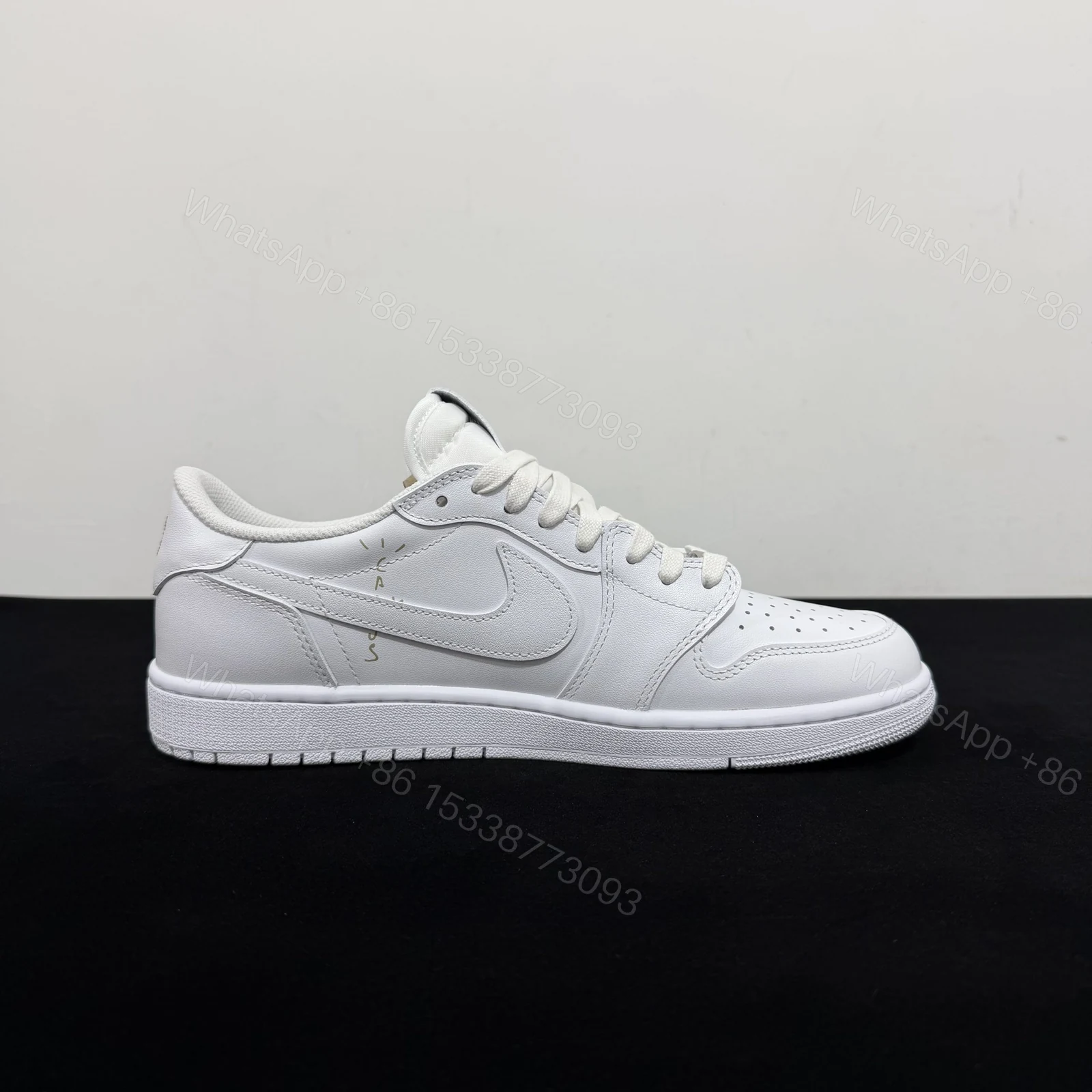 View 2 of Travis Scott x Jordan 1 White Party​ Reps