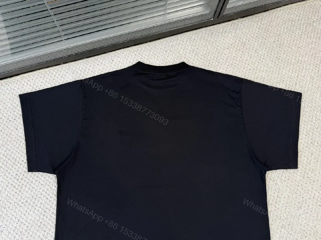 View 10 of Black Cotton Blend Relaxed Tee with Avant-Garde Graphic Edge