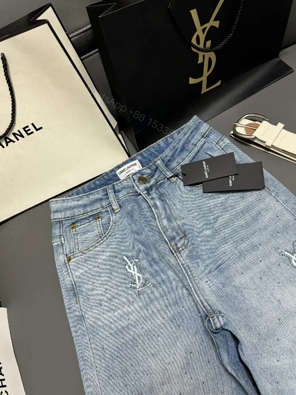 View 7 of Chic Distressed Couture: Wide-Leg Jeans with Emblems