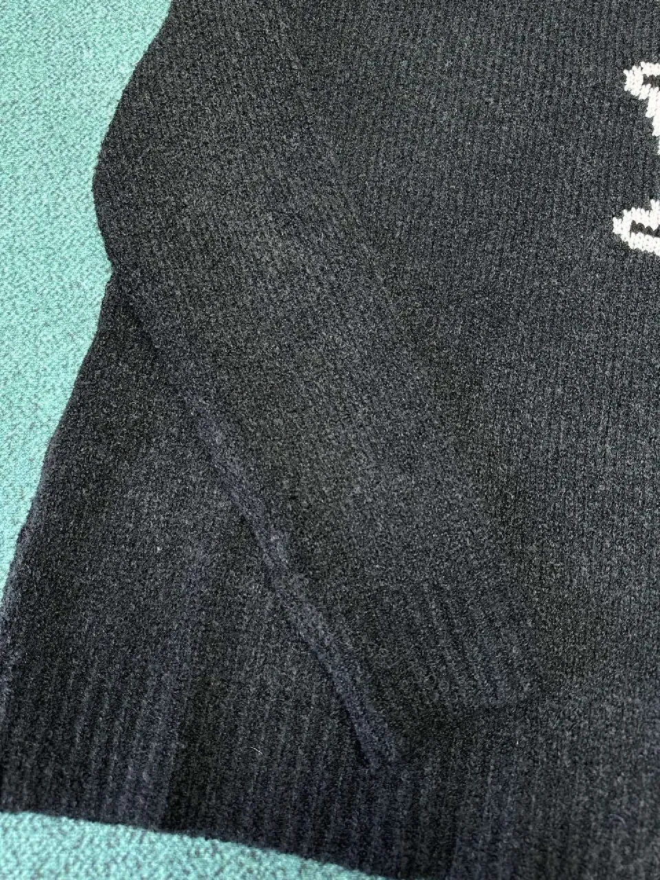 View 6 of Charcoal Knit Crewneck — Luxe Texture, Subtle Crest, Premium Comfort