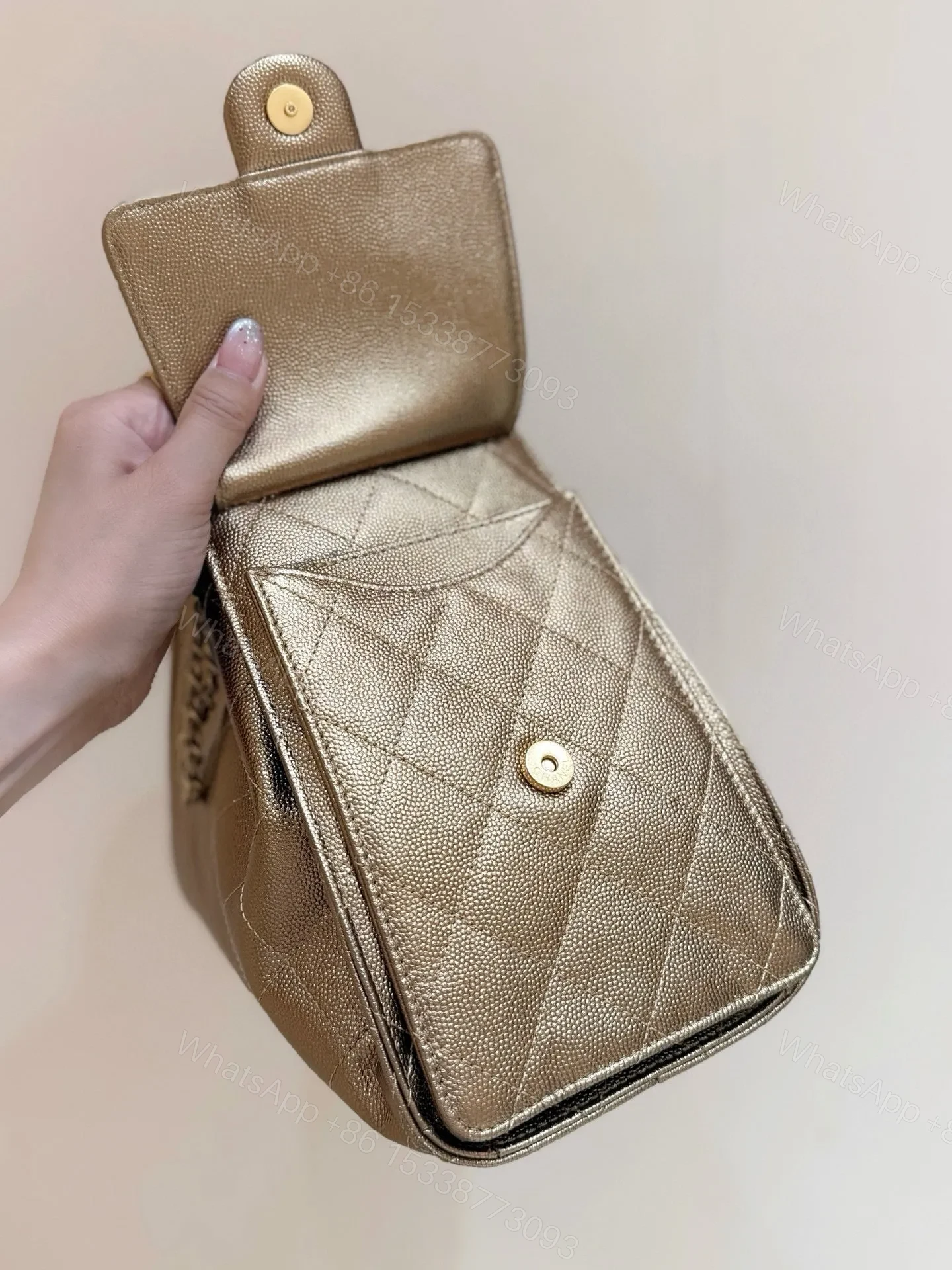 View 8 of CHANEL 25 HANDBAG 30 IN GOLDEN BROWN WITH GOLD HARDWARE