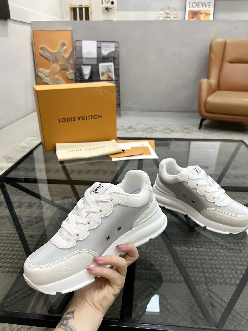 View 6 of White Leather Minimalist Luxe Sneakers with LV Detail