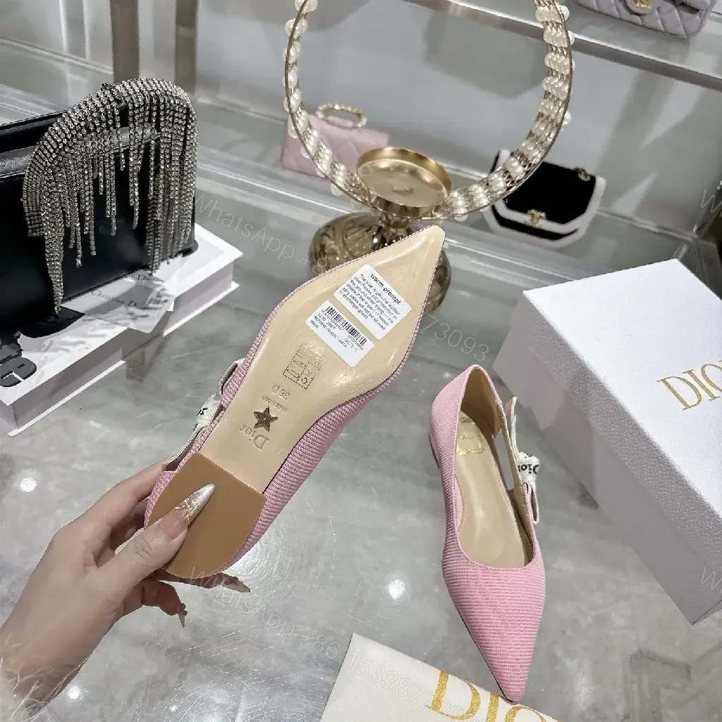 View 5 of Soft Pink Textured Slingback Heels with Logo Strap – Modern Luxe Pumps