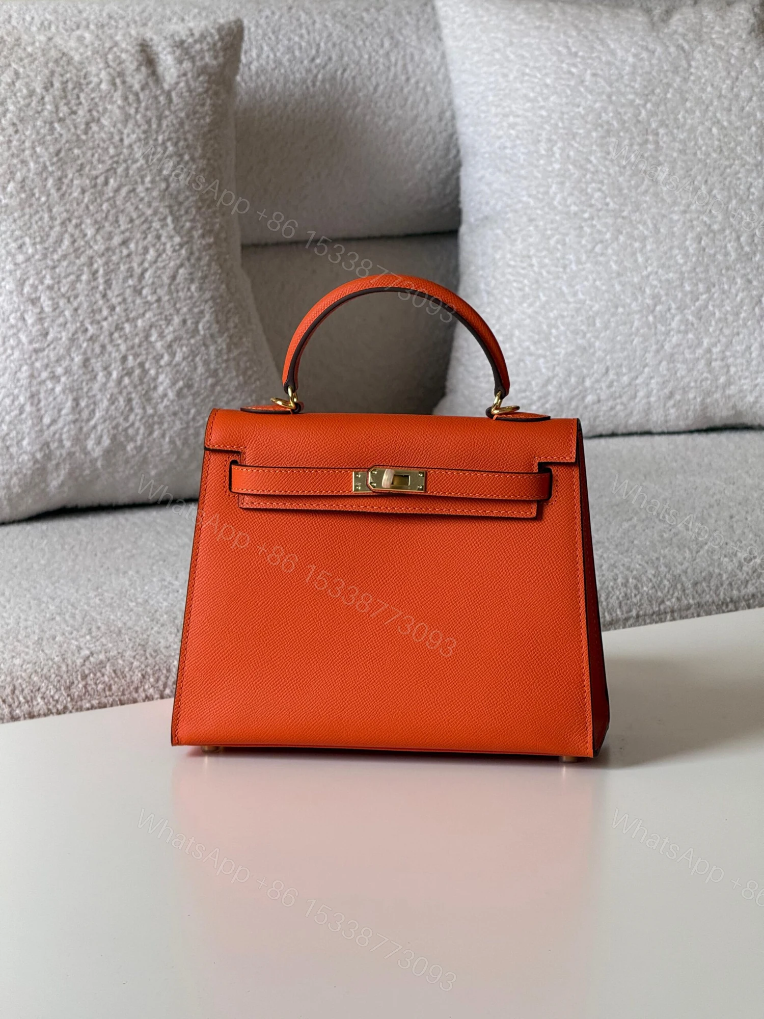 Hermès Kelly Sellier 25 bag in orange Epsom leather — view 1