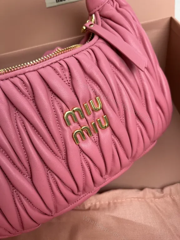 View 4 of Pink Quilted Miu Miu Mini Bag â€“ Luxury Everyday Chic