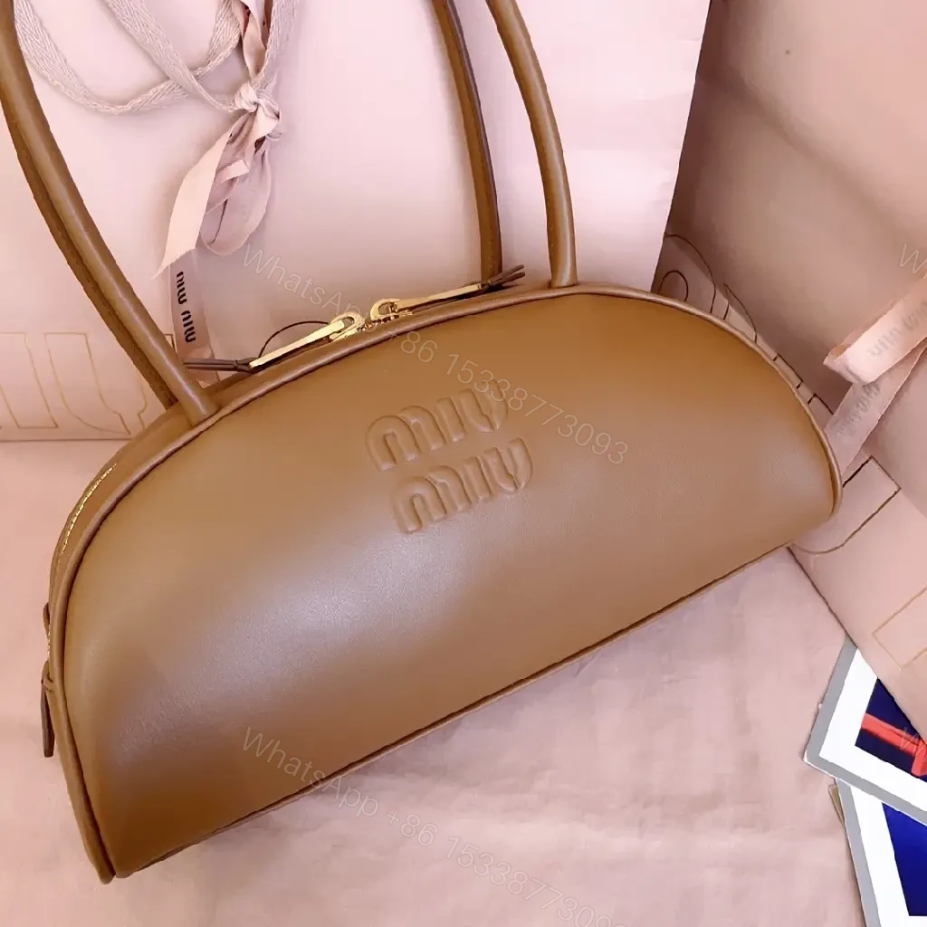 View 3 of Caramel Leather Dome Bag: Structured Luxury, Minimal Detailing