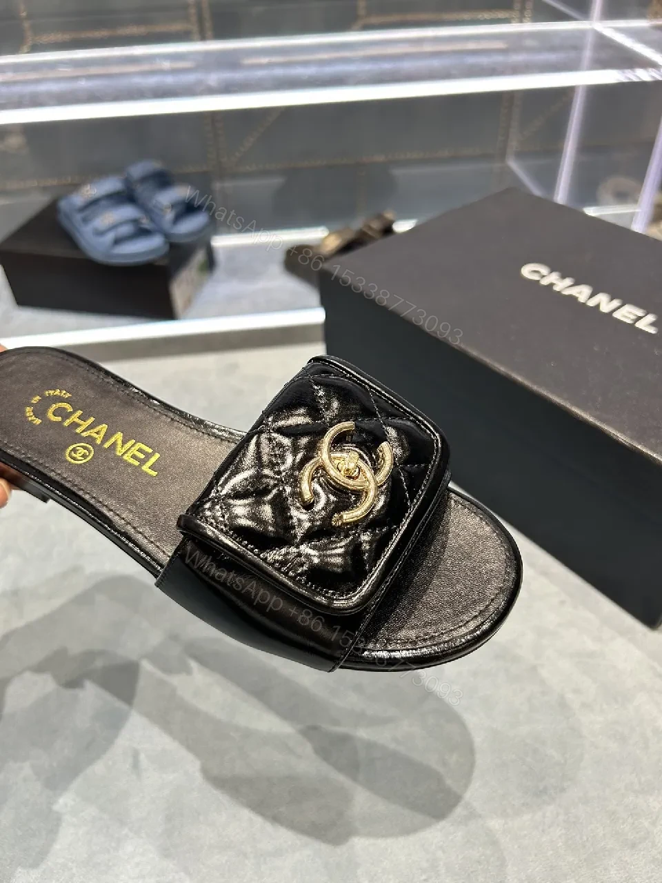 View 7 of Black Quilted Leather Slide with Gold Logo Escort