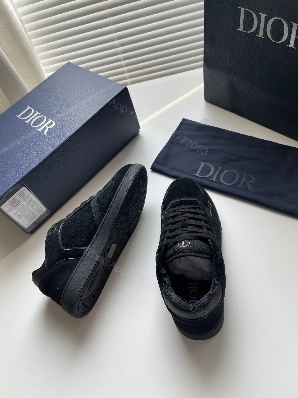 View 2 of Black Texture-Detail Sneaker: Subtle Luxe, All-Day Comfort