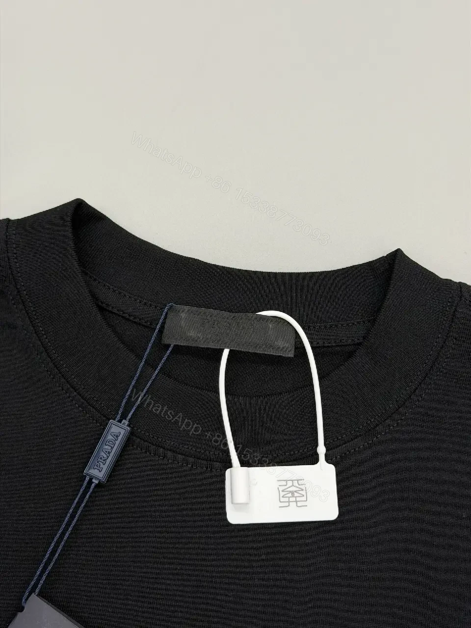 View 4 of Black Cotton Blend Tee with Prada Milano Graphic Embellishment
